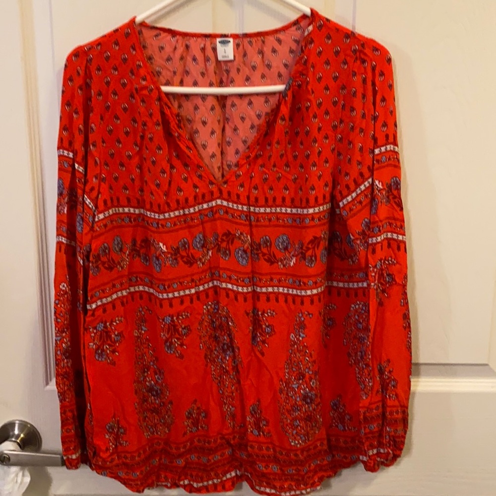 Old navy orange top.light blue and white flowers.  Can be worn casual or dress